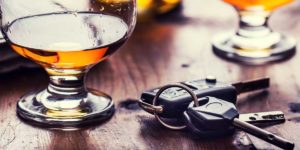picture of truck keys with an alcoholic drink